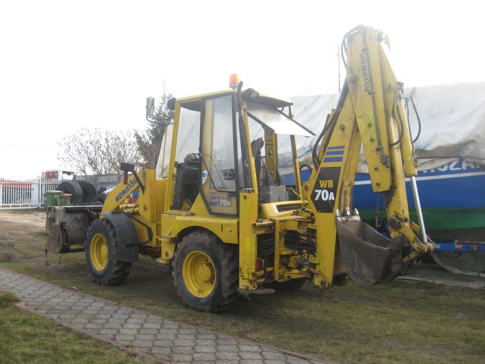 KOMATSU WB 70 tłoki i pierścienie